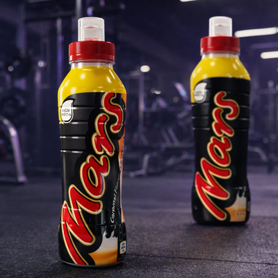 Two Mars Protein bottles in a gym setting