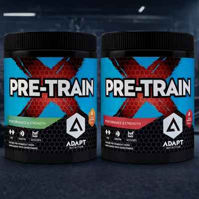 Two bottles of Pre-Train X supplement on a dark background with gym equipment.