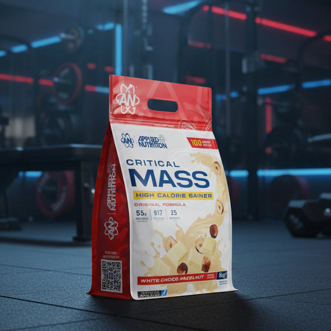 Applied Nutrition Critical Mass High Calorie Gainer package on a gym background