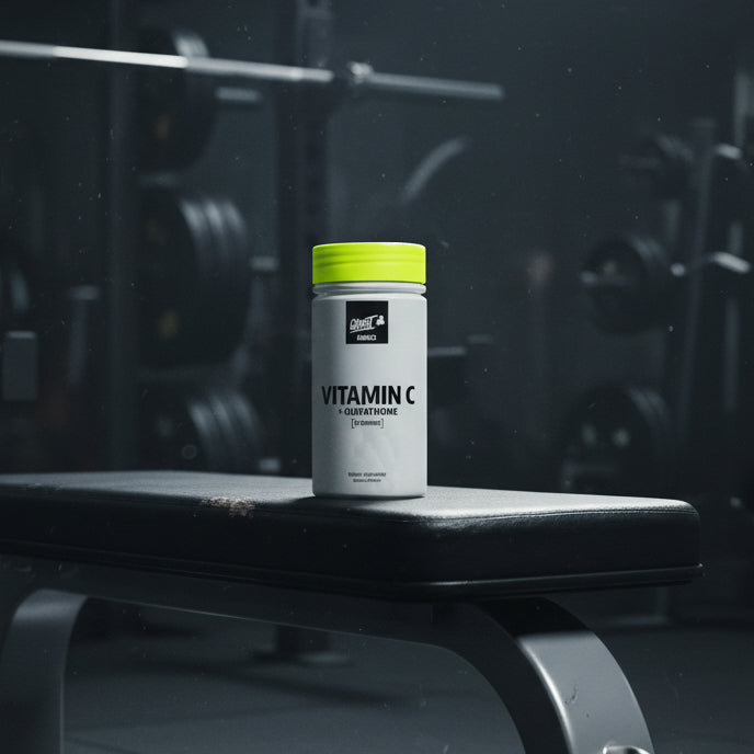 Supplement bottle labelled 'Vitamin C + Glutathione' with a yellow cap on a gym bench, featuring the Kong and Ghost Supplements logos.
