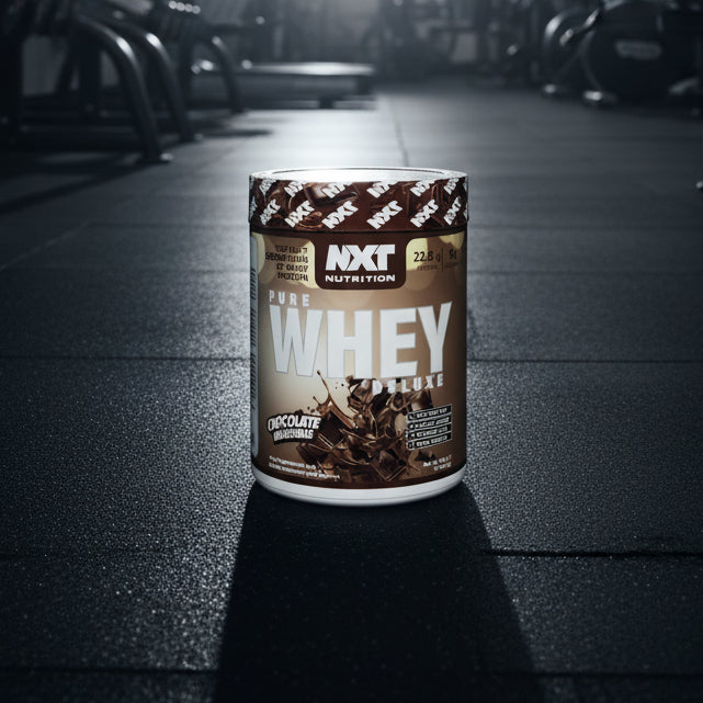 NXT Nutrition Pure Whey Deluxe chocolate milkshake protein powder container