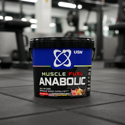 USN Muscle Fuel Anabolic supplement container on a gym floor