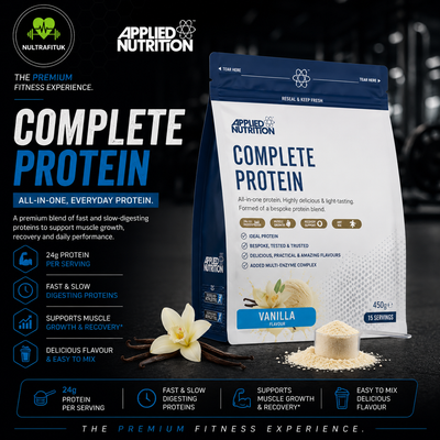 Single Stand-up pouch of Applied Nutrition complete protein supplement are displayed on a dark floor with a scoop of powder and vanilla. The package are shown in vanilla flavour.