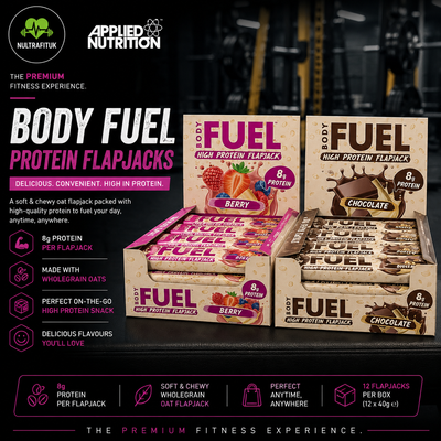 Applied Nutrition Body Fuel Protein Flapjacks displayed in retail boxes on a dark shelf, featuring Berry and Chocolate flavours with branding and product details.