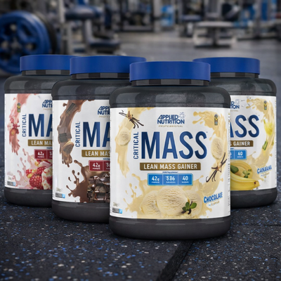 Applied Nutrition Critical Mass Professional tubs on a gym floor