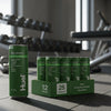 Huel Daily Greens Cans Peach & Hibiscus Flavour on a gym floor.