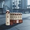 HUEL Lite Ready-to Drink chocolate flavour case on a gym floor.