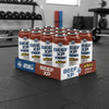 Beef XP protein cans in a display case on a gym floor