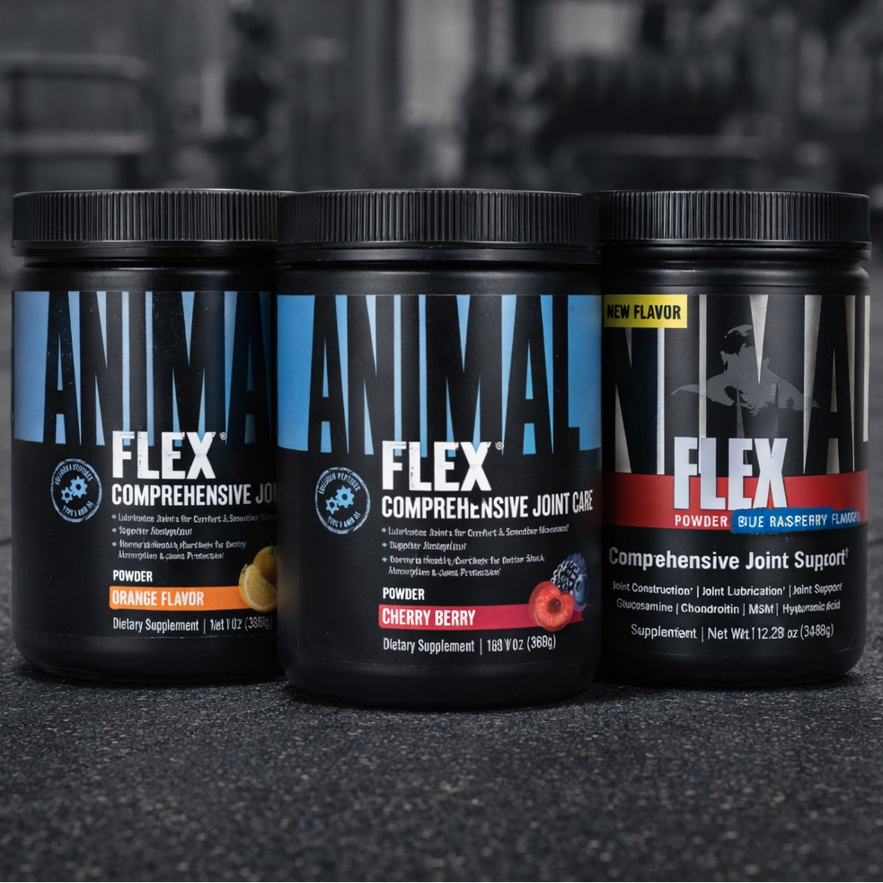 Three containers of Animal Flex supplement on a dark surface with a blurred background
