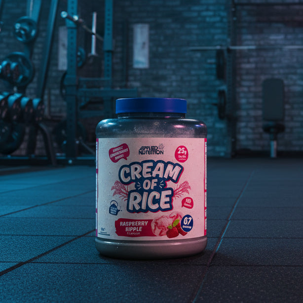 Applied Nutrition Cream Of Rice Raspberry Ripple flavour on a gym floor
