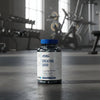Applied Nutrition Creatine 3000 Tub on a gym floor