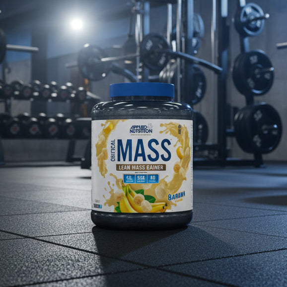 Applied Nutrition Critical Mass Professional banana flavour on a gym floor