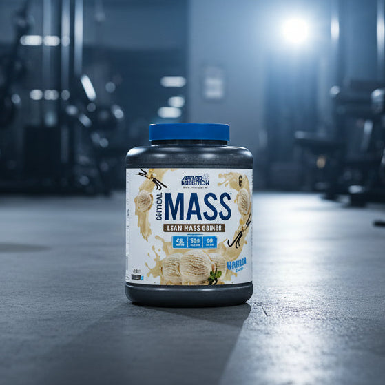 Applied Nutrition Critical Mass Professional vanilla flavour on a gym floor