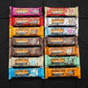 Assorted Grenade Carb Killa high protein bars in various flavours in a gym floor