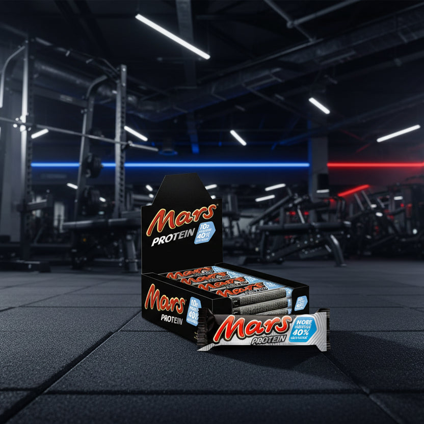Box of Mars Protein bars on a gym floor