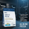 Protein powder package with vanilla flavor on a wooden surface