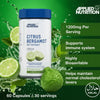 Supplement bottle with lime slices on a green background
