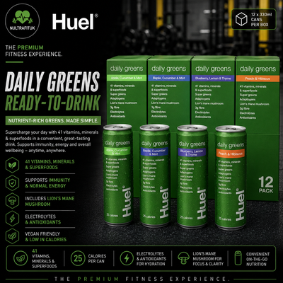 A 12-pack of Huel Daily Greens ready-to-drink cans displayed on a dark textured background with promotional text and logos. The cans are dark green with multi-coloured labels indicating different flavour combinations like Peaches & Milk Thistle, Blueberries, Lemon & Thyme, and Peaches & Milk Thistle.