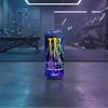 Monster Energy Zero Sugar can on a gym background
