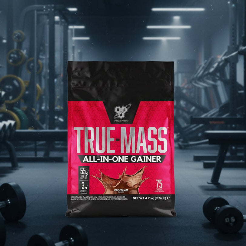 Bag of True Mass All-In-One Gainer in a gym setting
