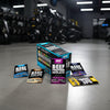 NXT beef protein isolate packaging on a gym floor with exercise equipment in the background