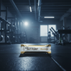 Bar of chocolate with 'The Salty Peanut' label on a gym floor
