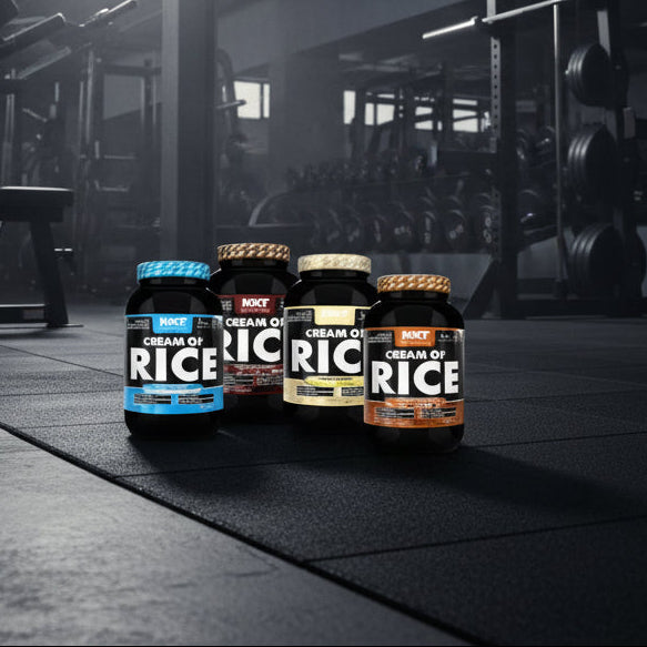 Four bottles of Cream of Rice on a gym floor with gym equipment in the background