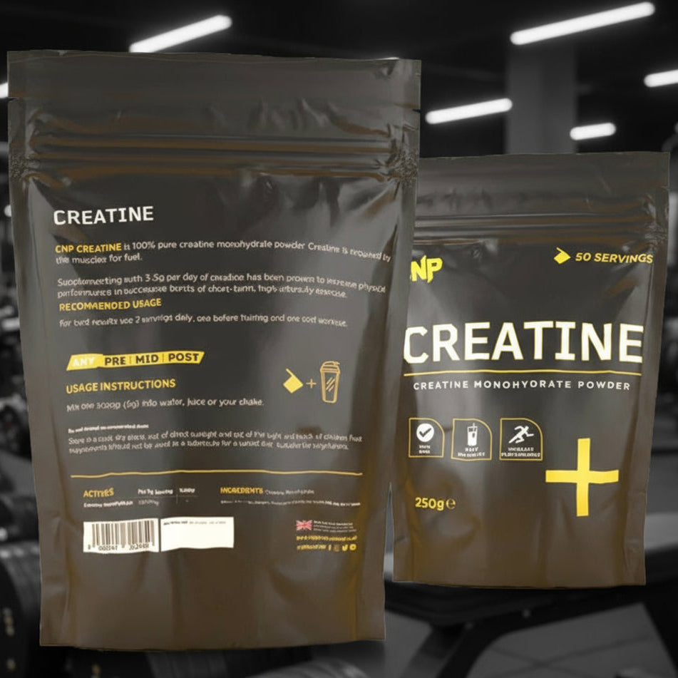 Two packages of creatine powder with nutritional information on a blurred gym background
