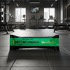 Barebells Hazelnut & Nougat protein bar packaging on a gym background