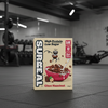 Box of Surreal Choc Hazelnut cereal in a gym setting