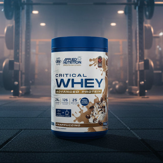 Applied Nutrition Critical Whey Tub on a gym floor