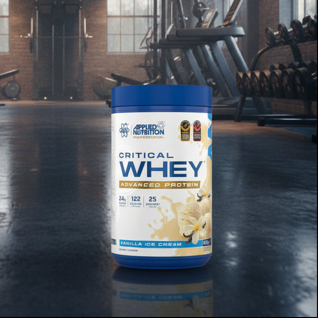 Applied Nutrition Critical Whey Tub on a gym floor