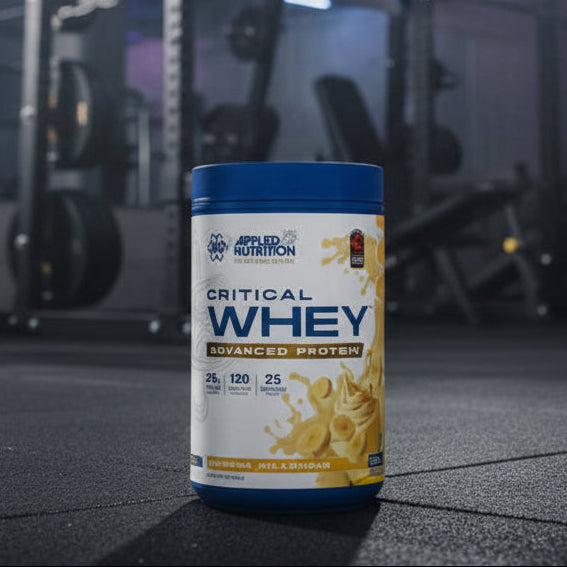 Applied Nutrition Critical Whey Tub on a gym floor