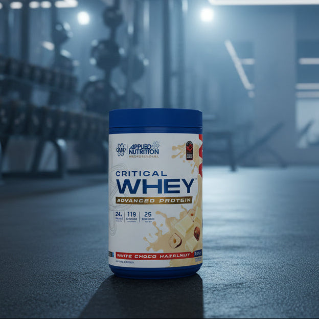 Applied Nutrition Critical Whey Tub on a gym floor