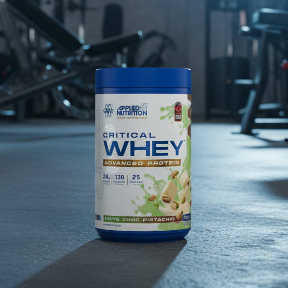 Applied Nutrition Critical Whey Tub on a gym floor