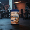 Applied Nutrition Critical Whey Tub on a gym floor