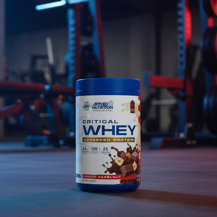 Applied Nutrition Critical Whey Tub on a gym floor